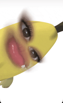 a banana with a woman 's face on it with her tongue out