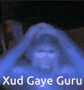 a blue background with the words xud gaye guru below it