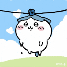 a cartoon character with a blue hat is hanging from a clothesline
