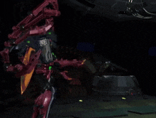 a robot with a purple head is standing next to another robot with a green head