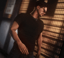 a man wearing sunglasses and a black shirt is standing in front of a building