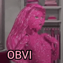 a pink barbie doll with the word obvi written on it
