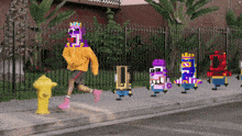 a person in a yellow sweatshirt is running down a sidewalk