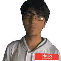 a man with glasses and a hello my name is tag