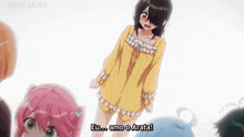 a girl in a yellow shirt is standing in front of a group of girls and says eu amo o arata