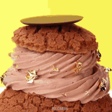 a close up of a chocolate cake with the words mr cakes written on the bottom
