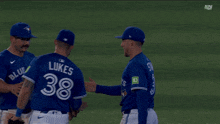 a baseball player with the number 38 on the back of his shirt