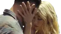 a man and woman are touching each other 's faces