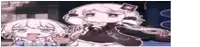 a couple of anime girls are standing next to each other and one of them is sticking out her tongue .