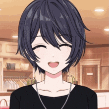 a girl with short black hair is smiling with her eyes closed and her mouth open
