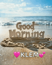 a picture of a beach with the words good morning klem on it