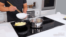 a person is cooking on a stove with the words made in animatica on the bottom right