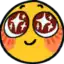 a yellow smiley face with stars in its eyes and a smile on its face .