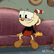 a cartoon character is sitting on a couch with a netflix logo in the background