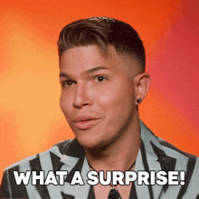 a man says " what a surprise " in front of a red background