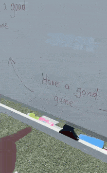 a man stands in front of a white board that says have a good game on it