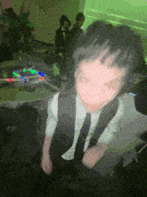 a blurry picture of a man in a suit and tie