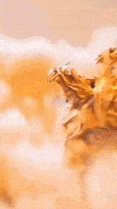 a painting of a lion with its mouth open