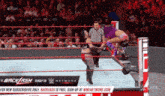 a woman in a wrestling ring with a sign that says " backlash "