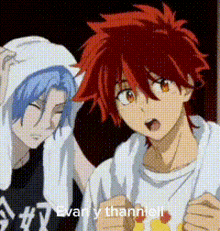 a couple of anime characters standing next to each other with a towel around their heads .