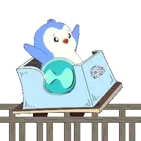a penguin is riding a roller coaster with a globe on it