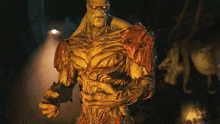 a statue of a swamp creature with a red eye