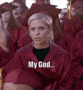 a girl in a graduation cap and gown says " my god "
