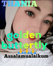 a picture of a woman with the words thania golden butterfly written on it