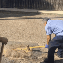 worker slamming corroded manhole cover