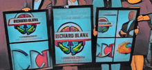 a group of people holding up a book called richard blank