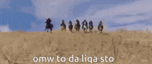 a group of cowboys are riding horses in a field in a video game .