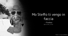a black and white photo of an owl wearing sunglasses and a hat with the words mo steffo ti vengo in faccia