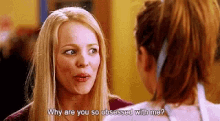 two women are talking to each other and one is asking the other why are you so obsessed with me ?