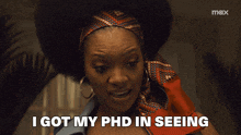a woman says i got my phd in seeing while wearing a headband