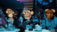 a group of people sitting around a table with a picture of a monkey and a picture of a man with a dog nose