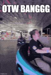 a woman is riding a bumper car with the words otw banggg written above her