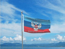 a russian flag with a coat of arms on it