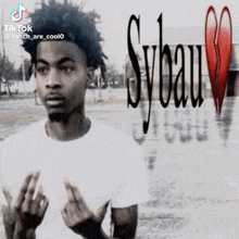 a black and white photo of a man with sybau written on the front