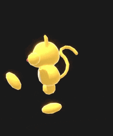 a yellow cat with a pink nose and a yellow ball on its head