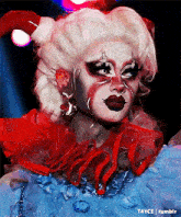 a close up of a drag queen 's face with t4yce tumblr written below it