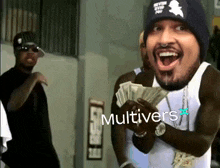 a man is holding a bunch of money with the word multivers written on the bottom