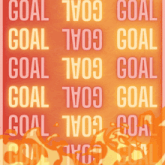 the word goal is on a red background with a sticker