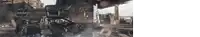 a train is going under a bridge with smoke coming out of the engine