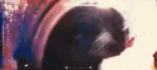a close up of a person 's face with a blurred background