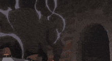 a man is laying on the floor with smoke coming out of him