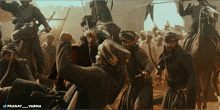 a group of men on horses are fighting in a scene from a movie called pranay varma