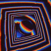 a colorful optical illusion of a sphere in a square surrounded by squares
