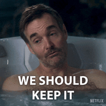 a man in a bathtub with the words we should keep it on the bottom