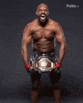 a man holding a ufc championship belt with his mouth wide open
