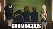 a group of anime girls standing in front of a blackboard with the words chumingods written on the bottom